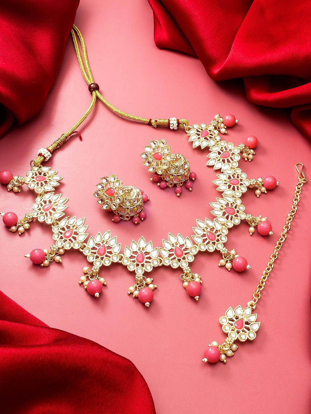 

aadita Gold-Plated Pink & White Stone-Studded & Pearl-Beaded Jewellery Set