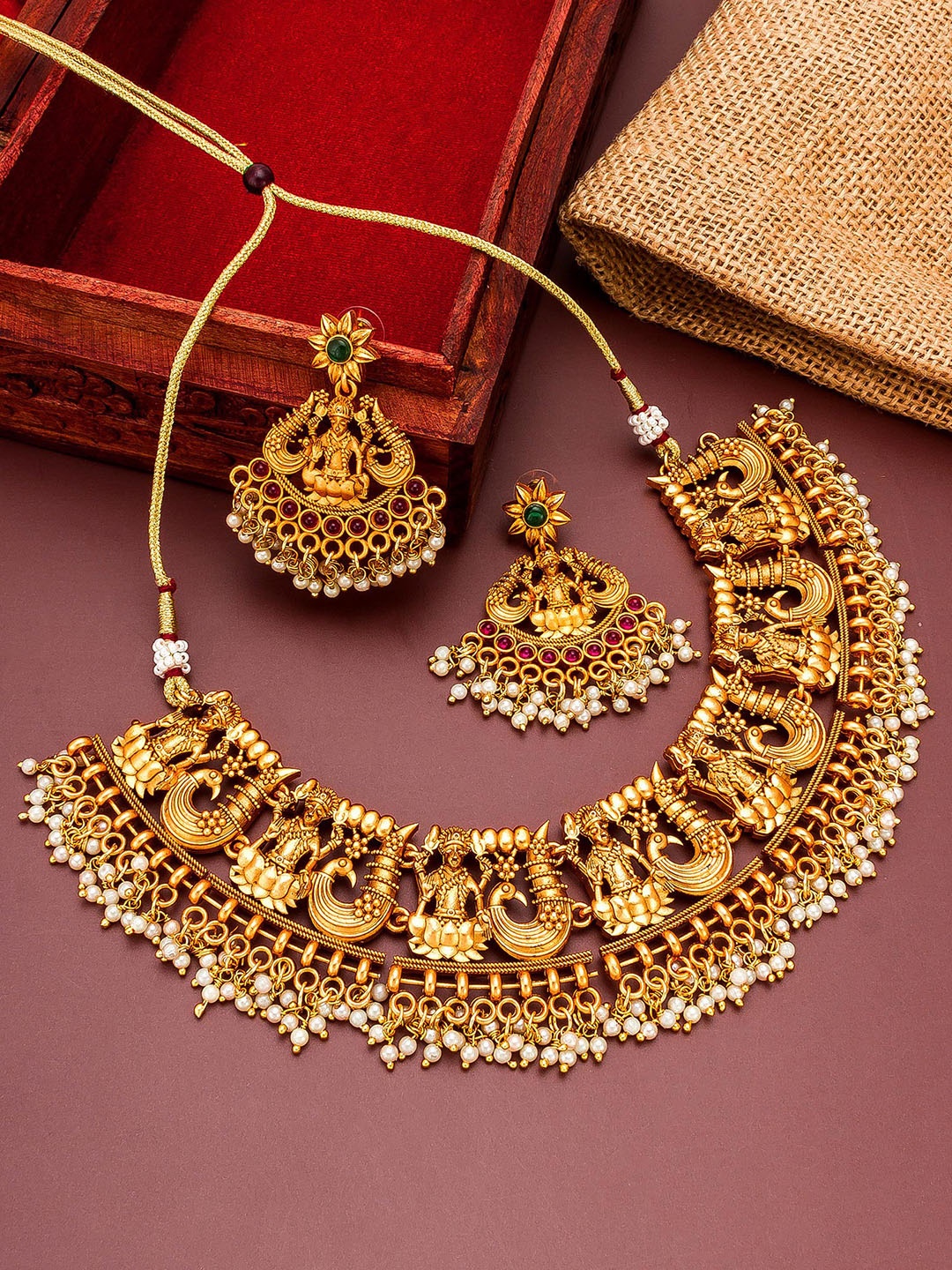 

aadita Gold-Plated White & Red Stone Studded & Beaded Jewellery Set