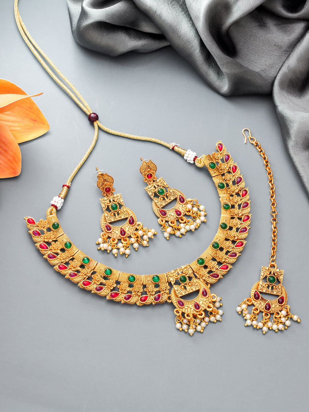 

aadita Gold-Plated Pink & Green Stones Studded & Pearl Beaded Temple Jewellery Set
