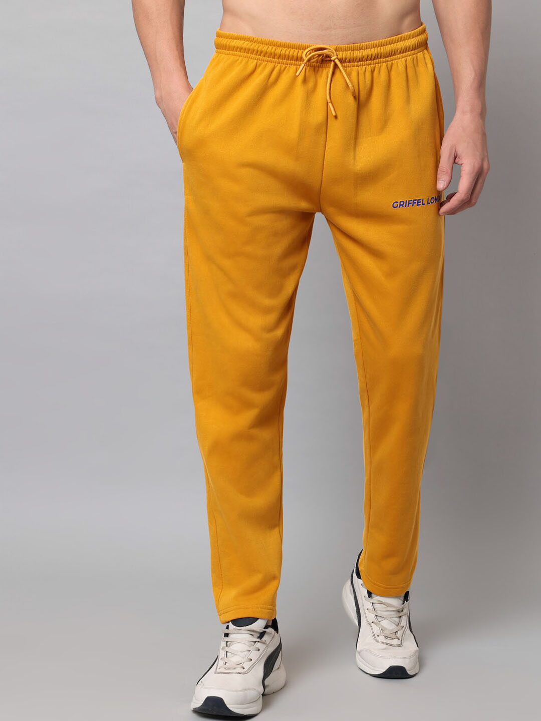 

GRIFFEL Men Mustard Solid Cotton Track Pants