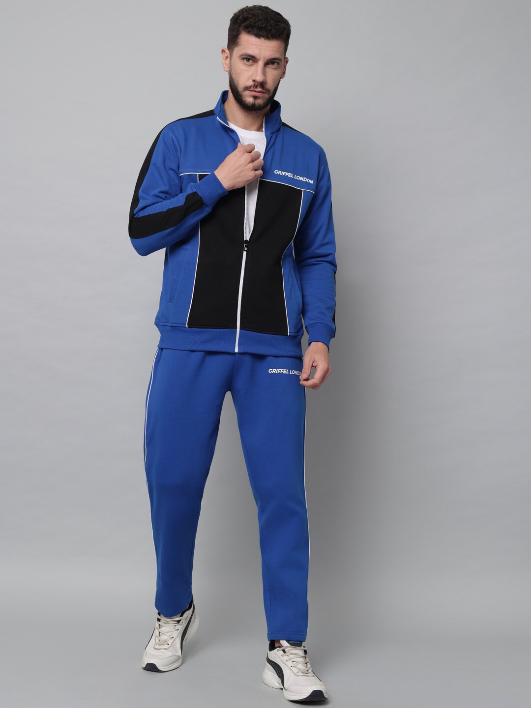 

GRIFFEL Men Blue & Black Solid Tracksuit