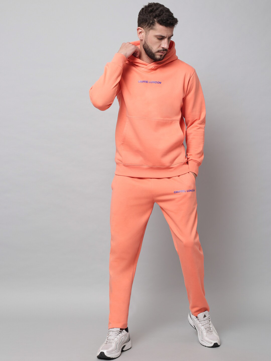 

GRIFFEL Men Peach-Coloured Solid Hooded Tracksuits