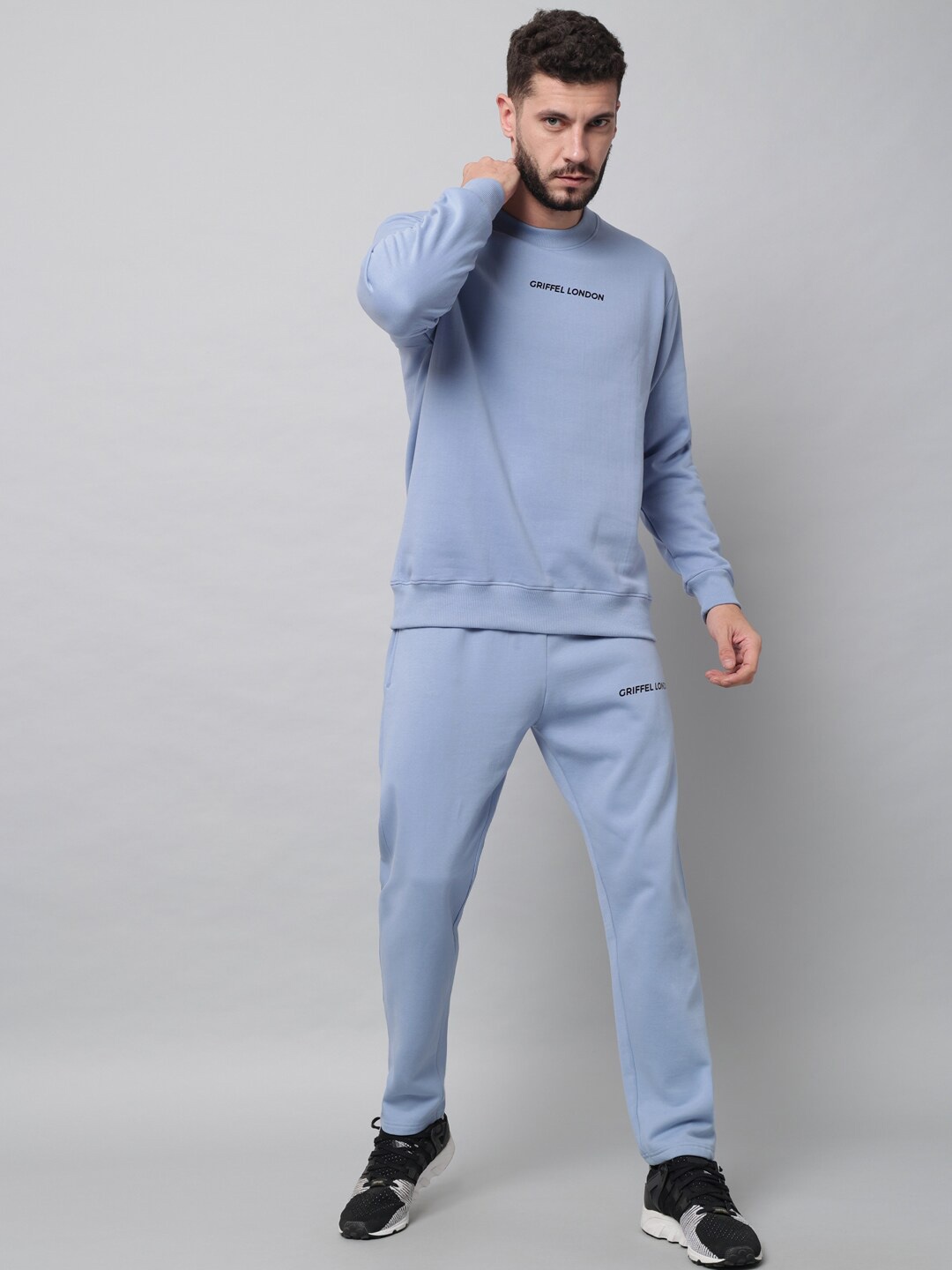 

GRIFFEL Men Blue Solid Tracksuits