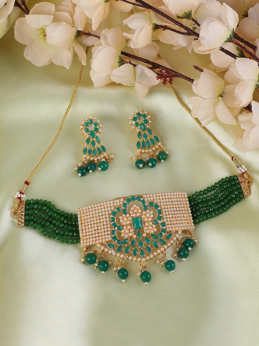 

ANIKAS CREATION Gold-Plated Green Stone-Studded & Beaded Jewellery Set