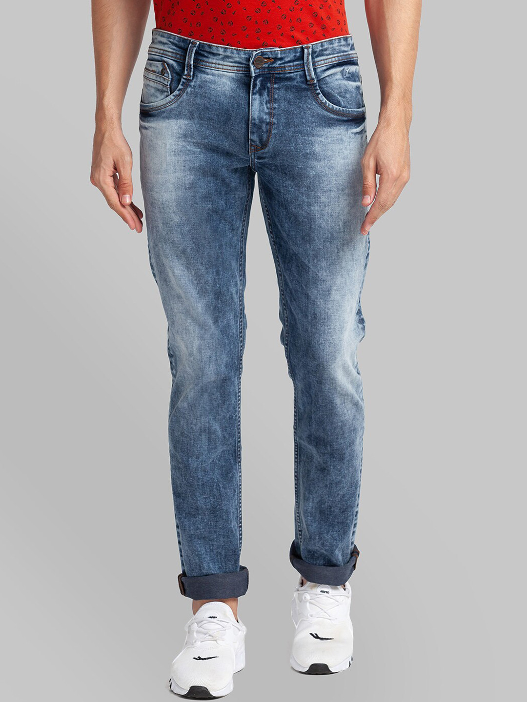 

Parx Men Blue Tapered Fit Mildly Distressed Heavy Fade Jeans