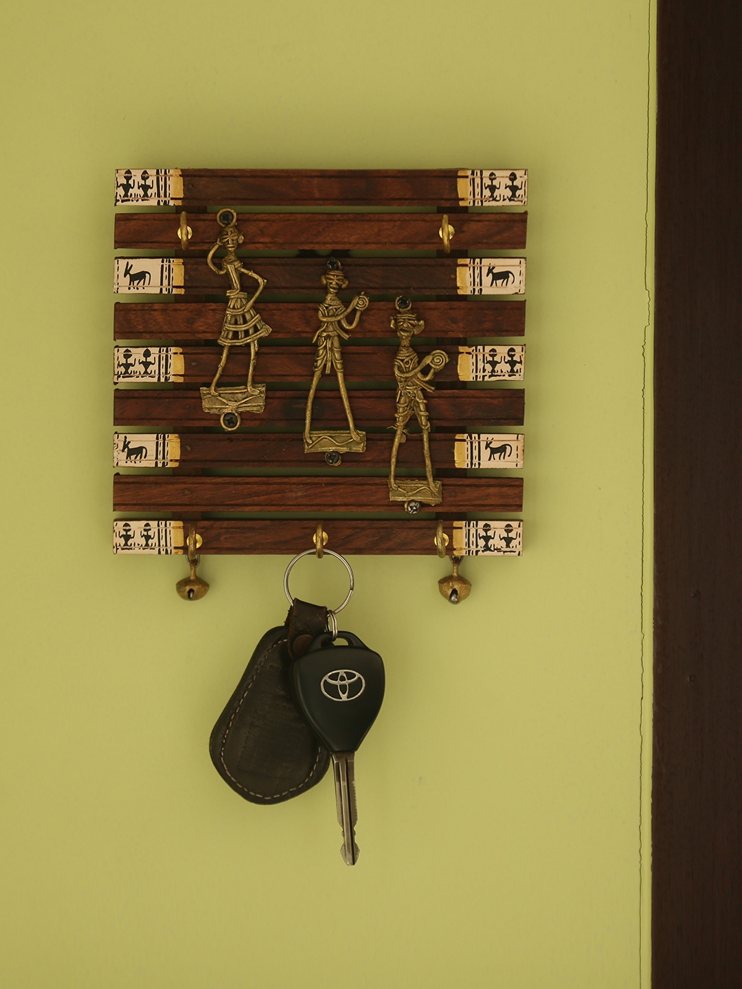 

ExclusiveLane Brown Wooden Dhokra Warli Work Key Holders