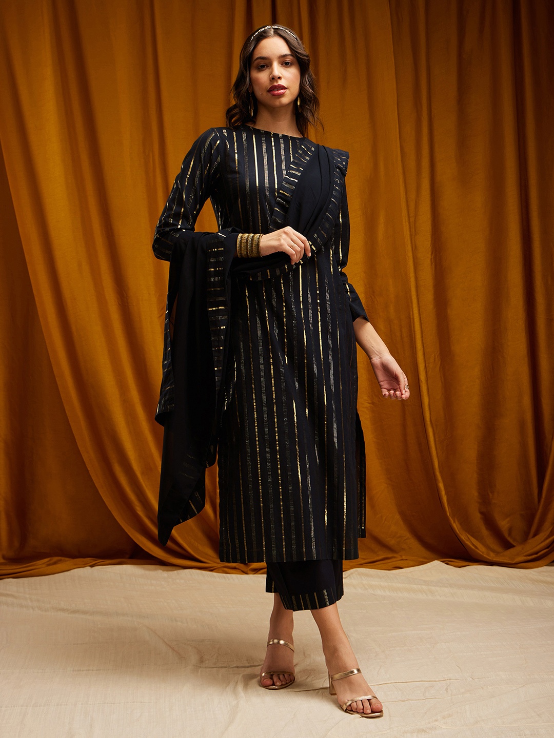 

Pink Fort Women Black Striped Kurta with Palazzos & With Dupatta