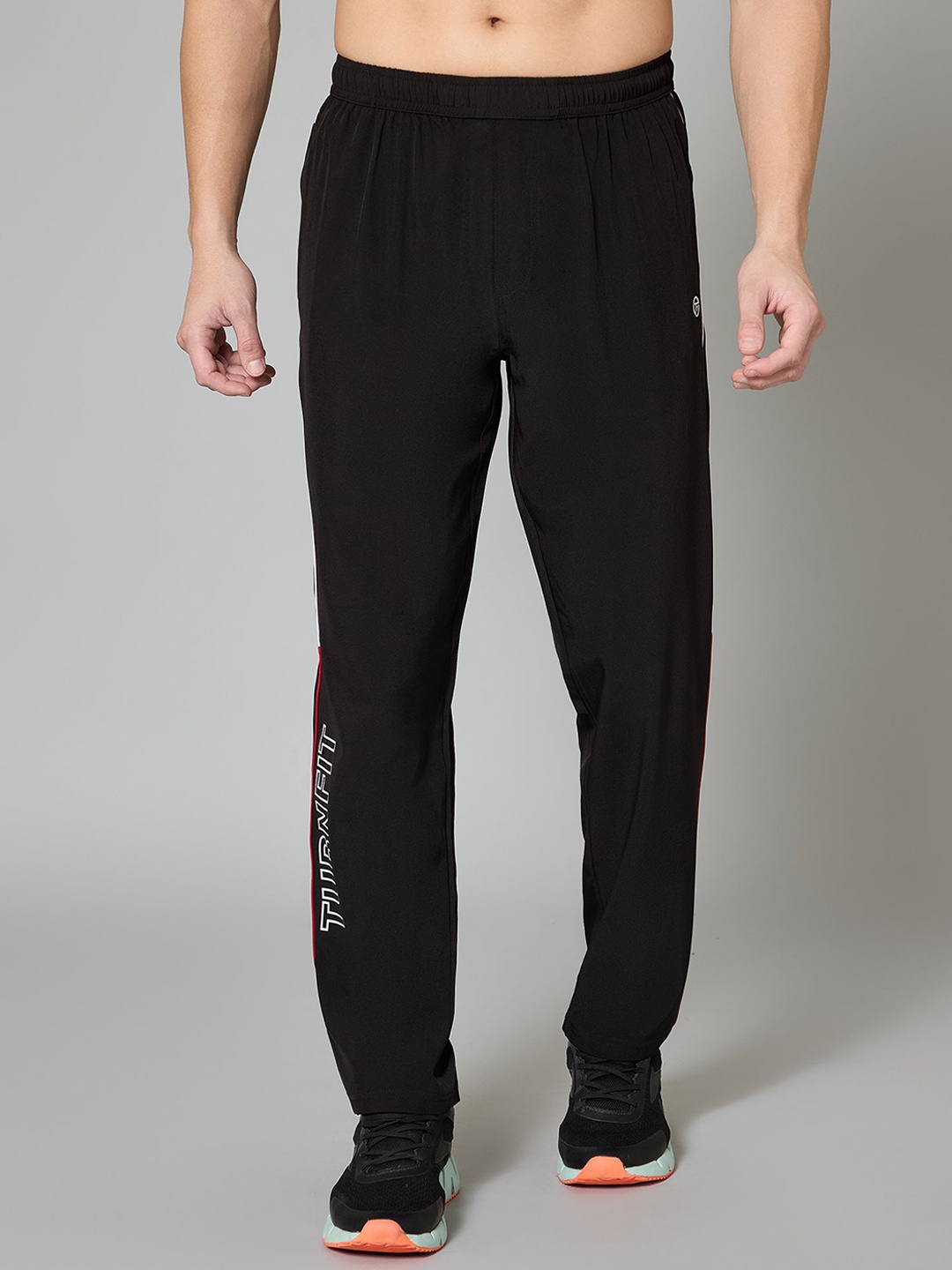

TURNFIT Men Typographic Printed Mid-Rise Track Pants, Black