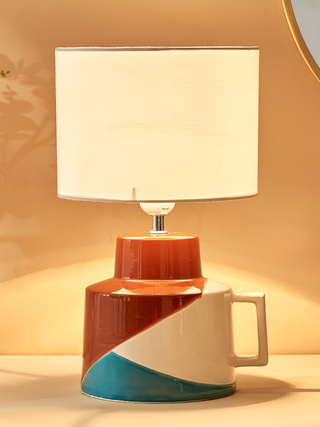 

Home Centre Splendid White Textured Ceramic Cylindrical Shaped Table Lamp