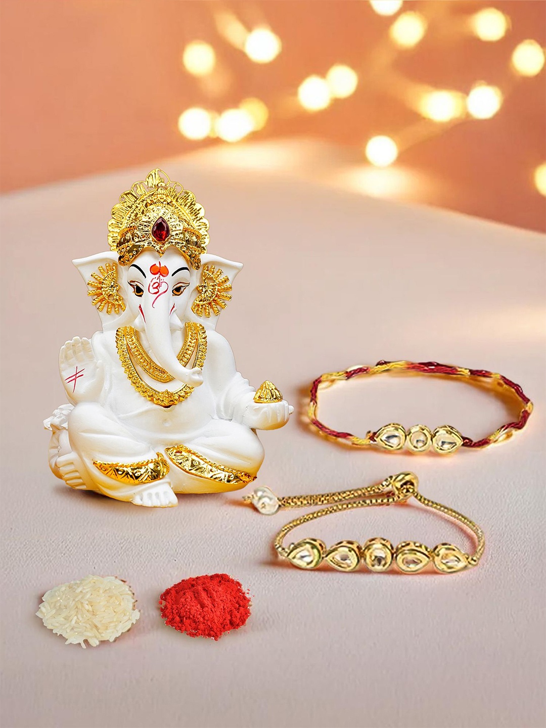 

Ekhasa Set Of 3 Rakhi With Ganesha Idol & Roli Chawal Rakhi, White