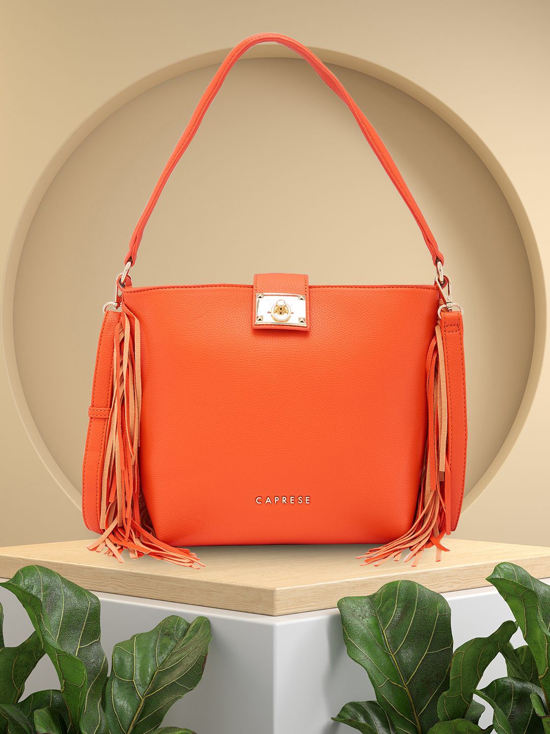 

Caprese PU Structured Shoulder Bag with Tasselled, Yellow