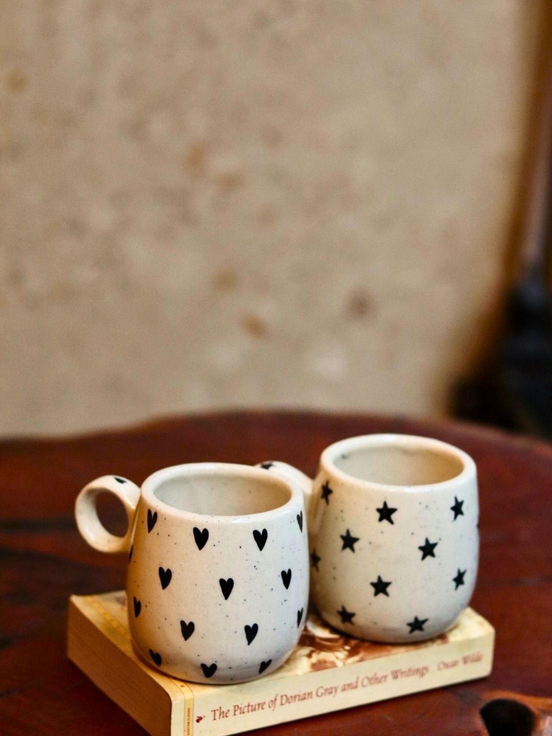 

WEAVING HOMES Cream & Black 2 Pcs Printed Ceramic Glossy Finished Mugs 250 ml Each