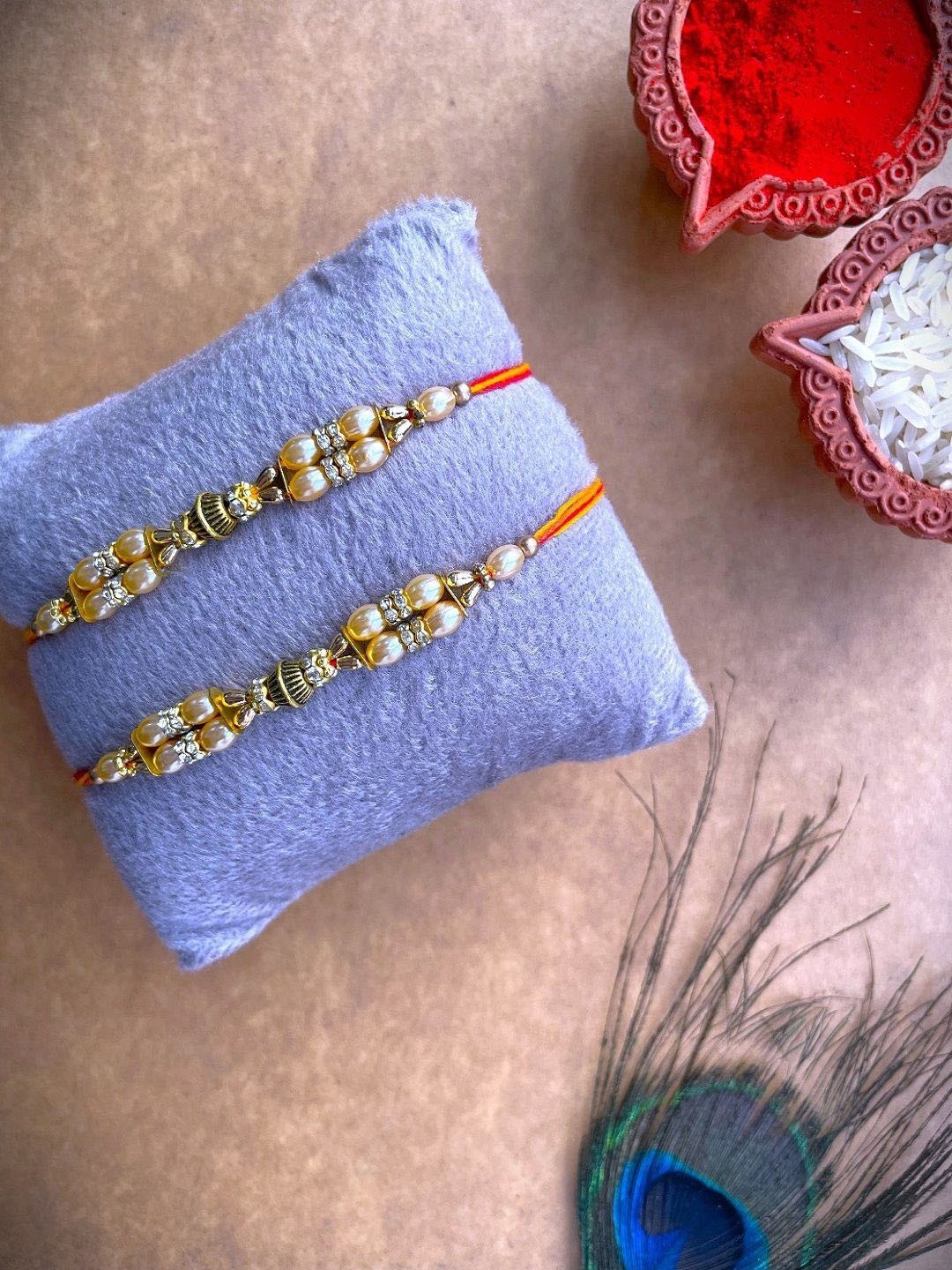

Crunchy Fashion Set Of 2 Beaded & Stone Studded Thread Rakhi With Roli Chawal, Off white