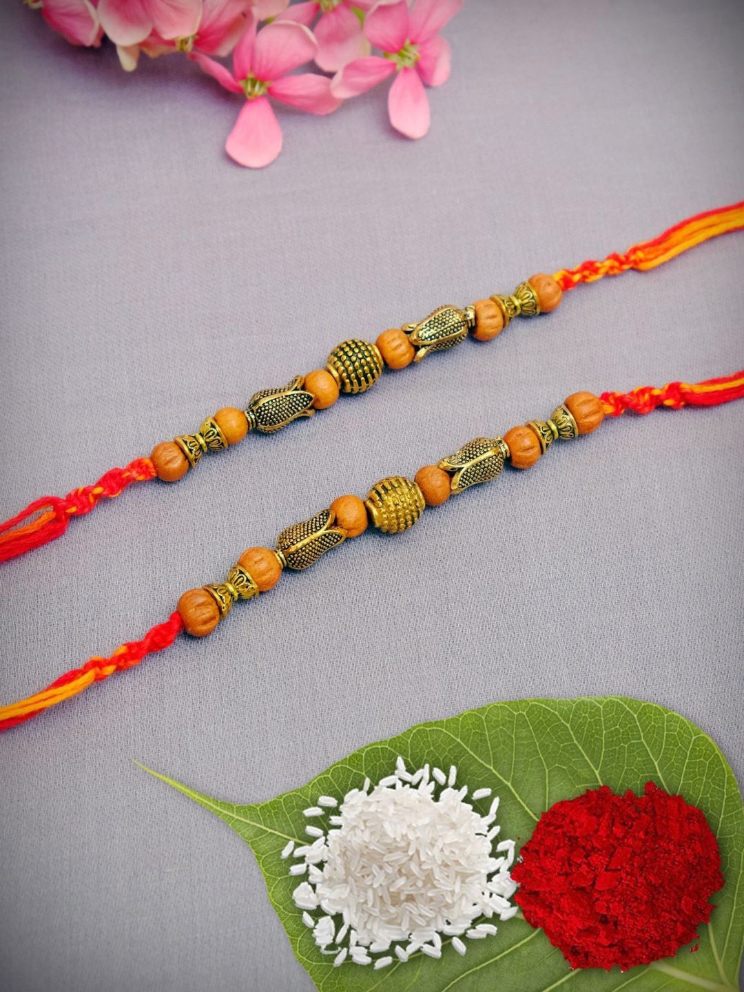 

Crunchy Fashion Set Of 2 Thread & Beaded Rakhi, Gold