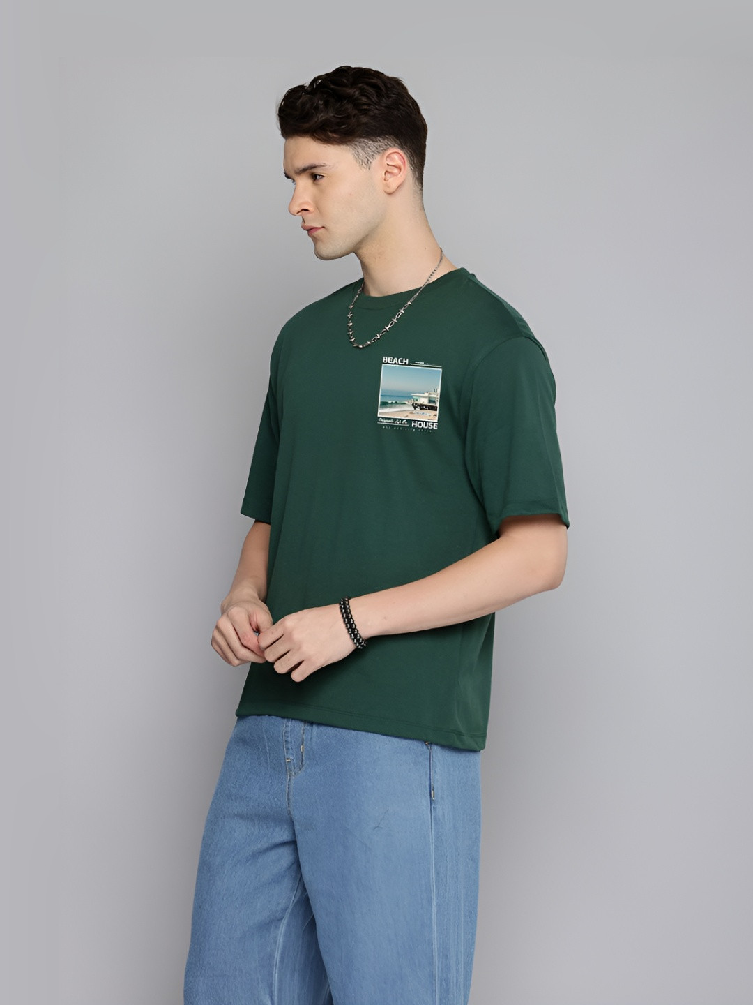 

The Roadster Lifestyle Co. Men Graphic Printed Round Neck Cotton Oversized T-shirt, Green