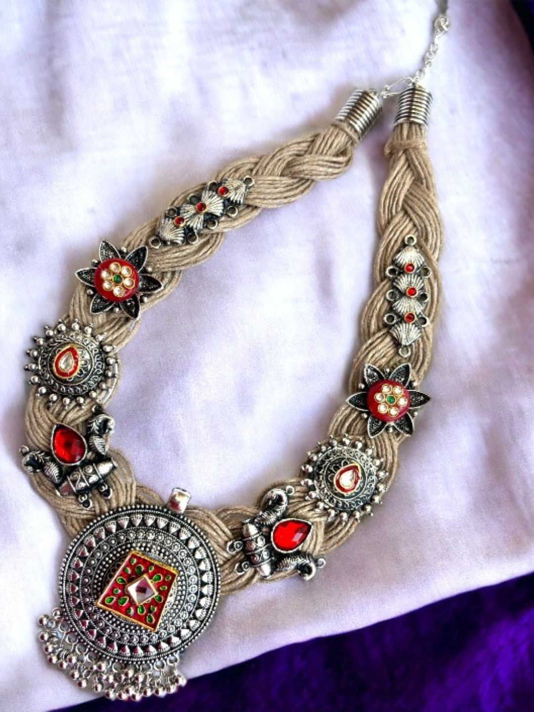 

VIVAZS Brass And Jute Oxidised Silver Red Enemald Kundan Studded Crochet Necklace, Gold