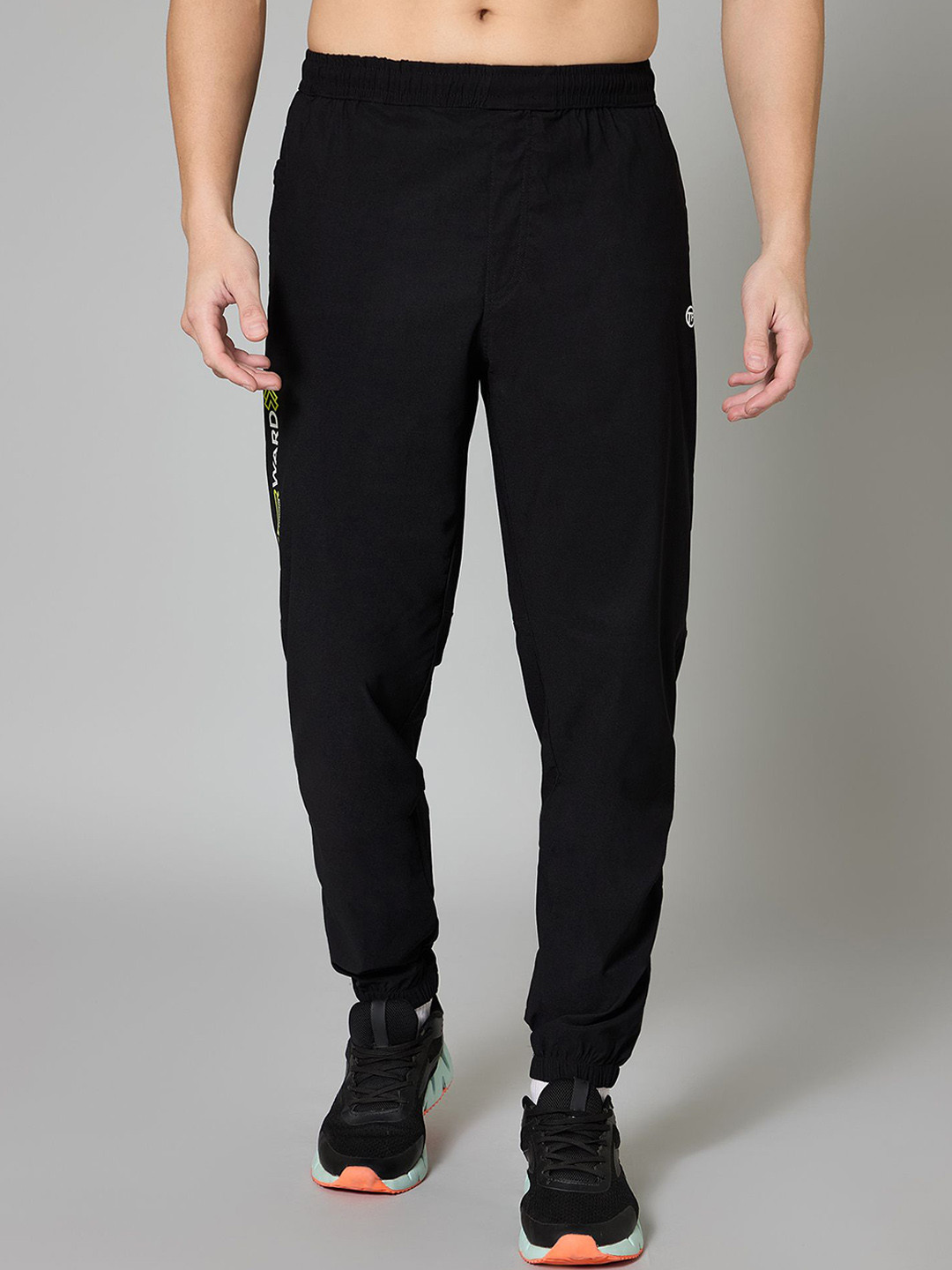 

TURNFIT Men Typographic Print Joggers Track Pants, Black
