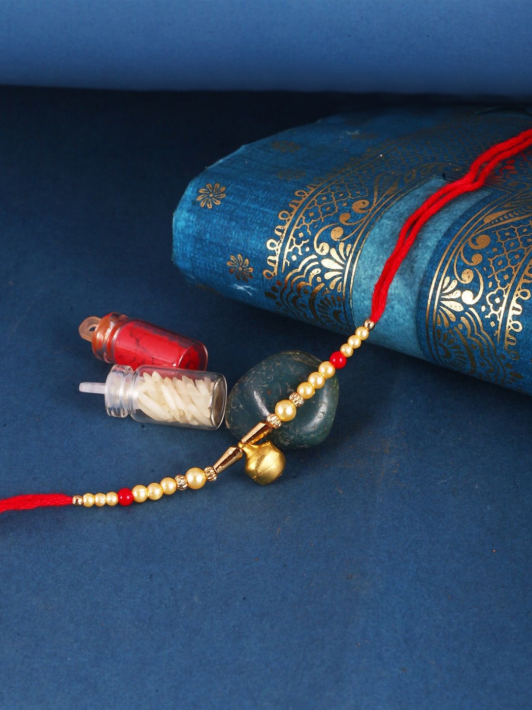 

Vighnaharta Kids Set of 3 Gold and Rhodium Plated Fancy Pearls Rudraksha Thread Rakhis, Red