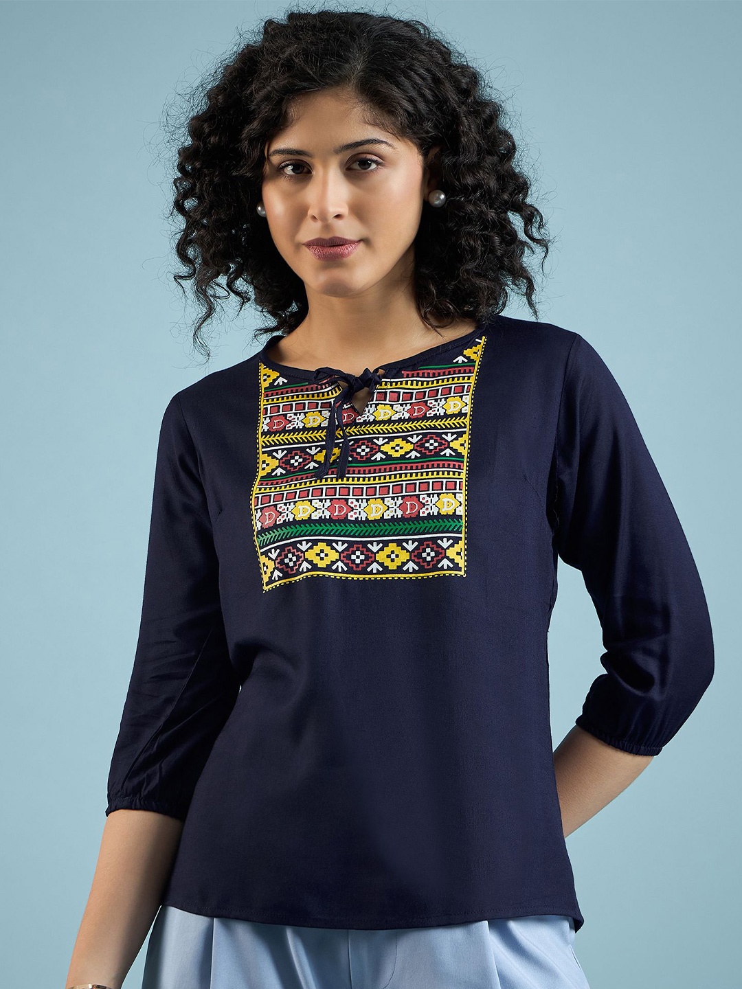 

DressBerry Women Ethnic Motifs Printed Tie-Up Neck Viscose Rayon Top, Navy blue