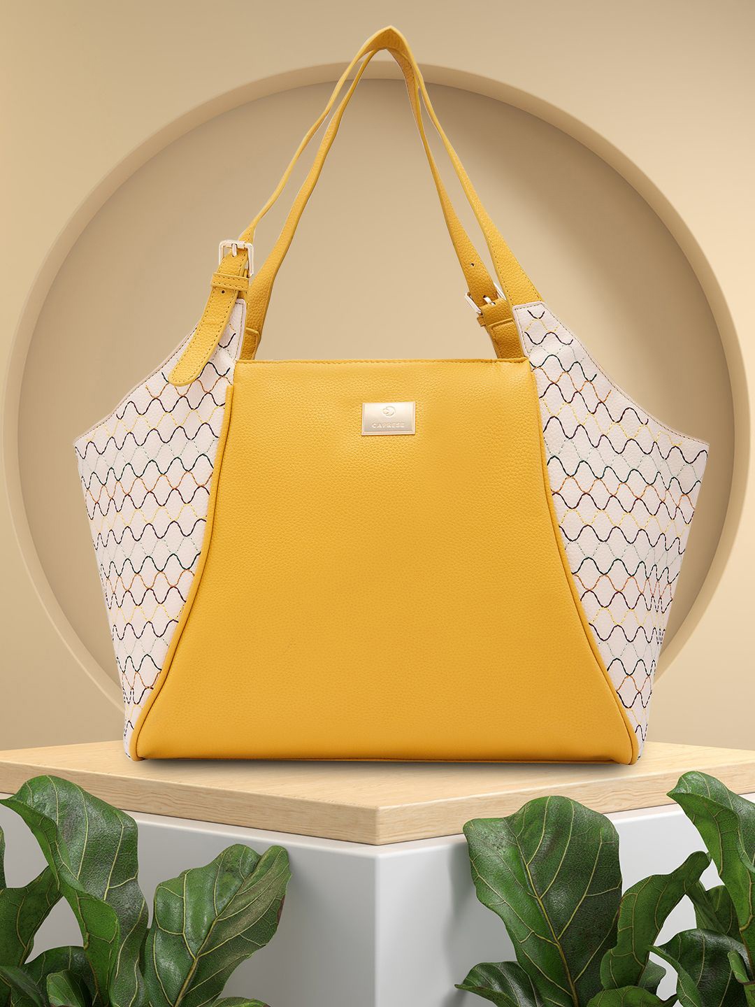 

Caprese Printed PU Structured Shoulder Bag with Applique, Yellow