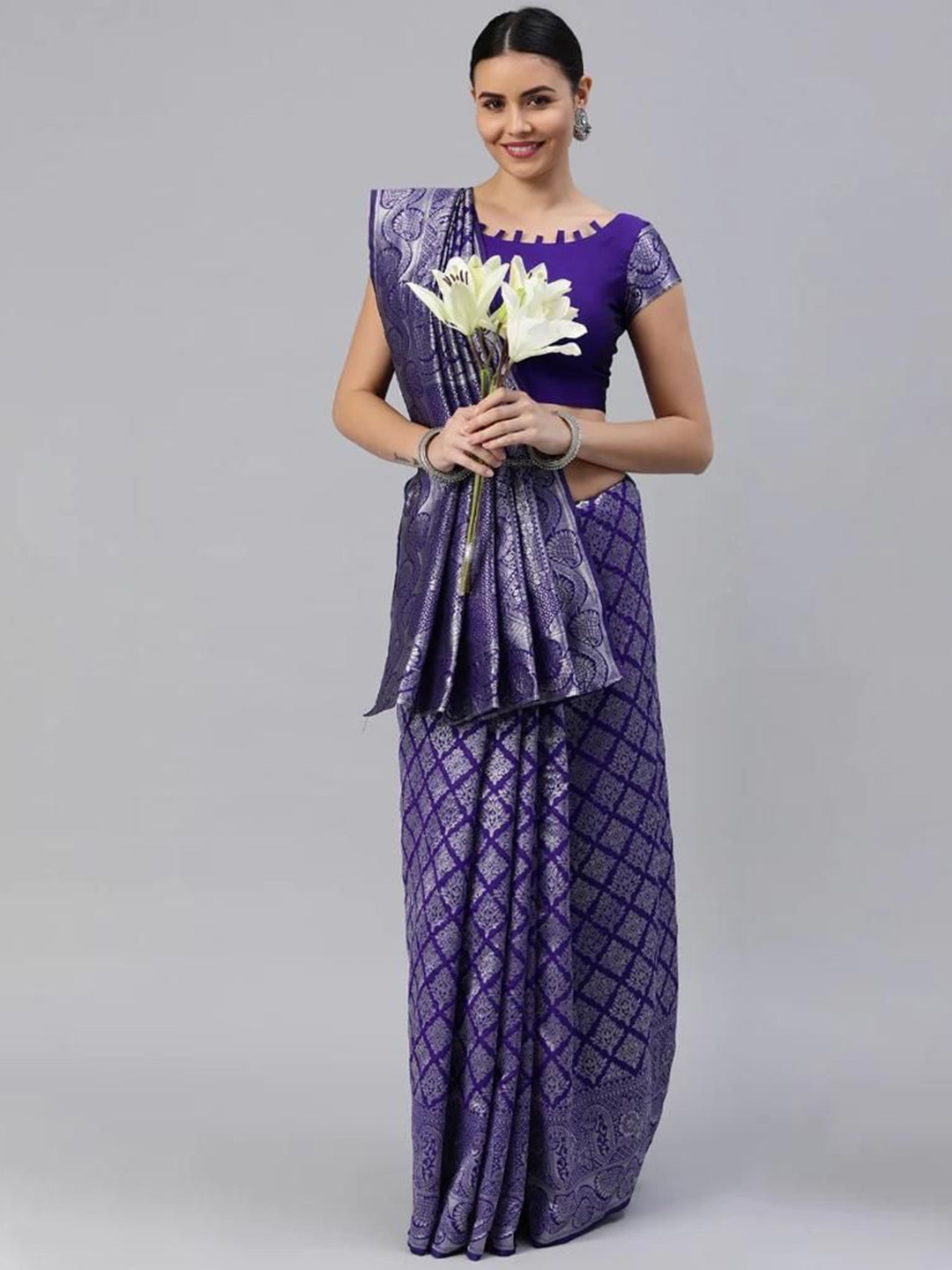 

Upalksh Women Woven Design Zari Kanjeevaram Saree, Purple