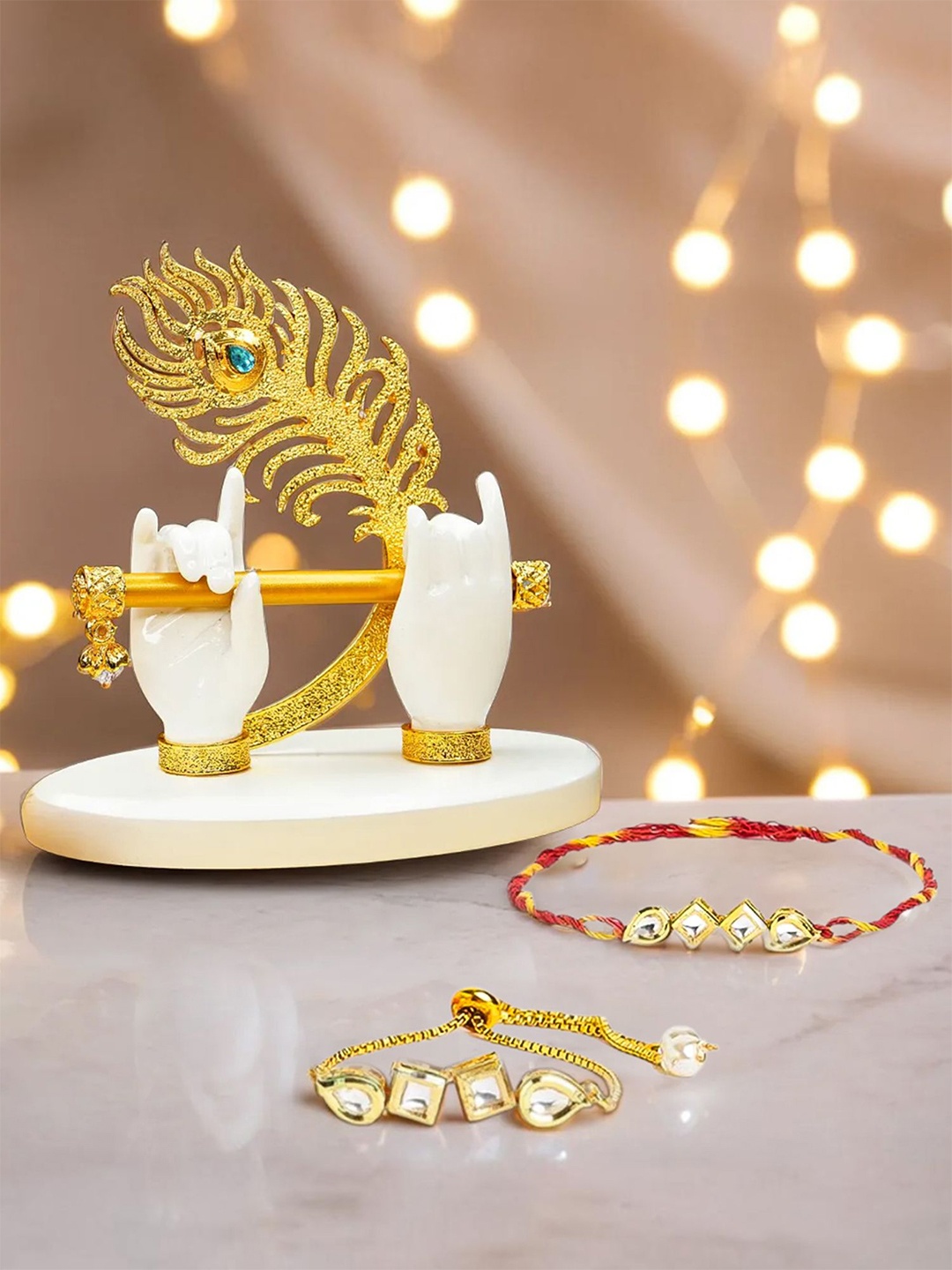 

Ekhasa Set Of 3 Bhaiya Bhabhi Rakhi With Krishna Hands Idol & Roli Chawal, Gold