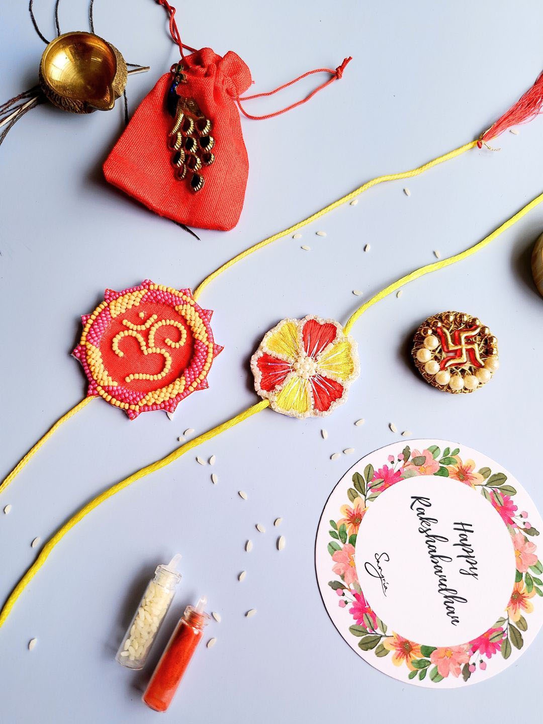 

Sangria Set Of 2 Rakhis With Roli Chawal & Card, Red