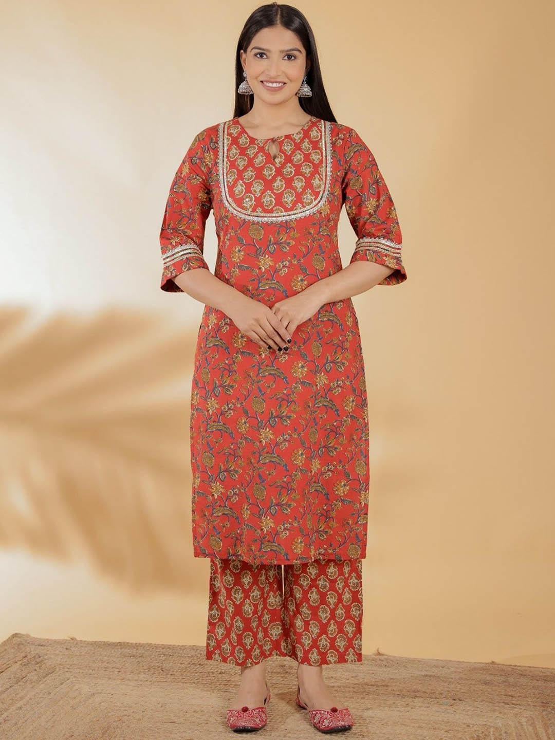

Aramya Women Floral Printed Regular Pure Cotton Kurta with Trousers, Red