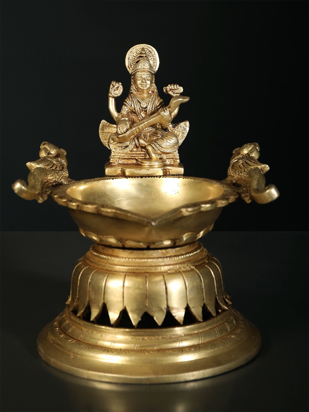 

Exotic India 8" Devi Saraswati Designer Oil Lamp (Diya) in Brass, Gold