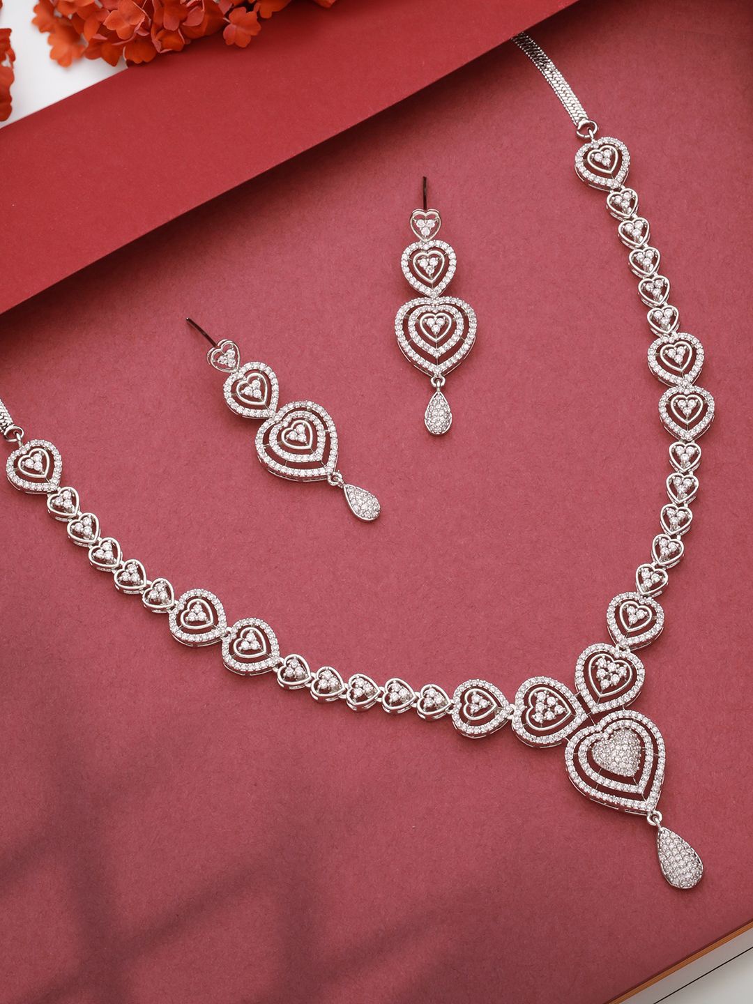 

Saraf RS Jewellery Silver Plated CZ Studded Jewellery Set