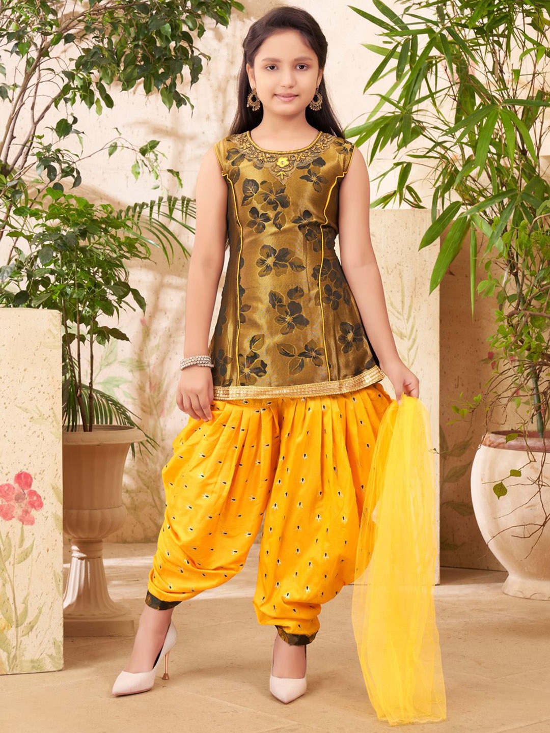 

Aarika Girls Floral Printed Regular Kurta with Dhoti Pants & With Dupatta, Gold