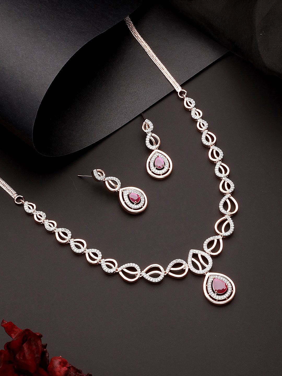 

Saraf RS Jewellery Rose Gold-Plated American Dimond Studded Jewellery Set