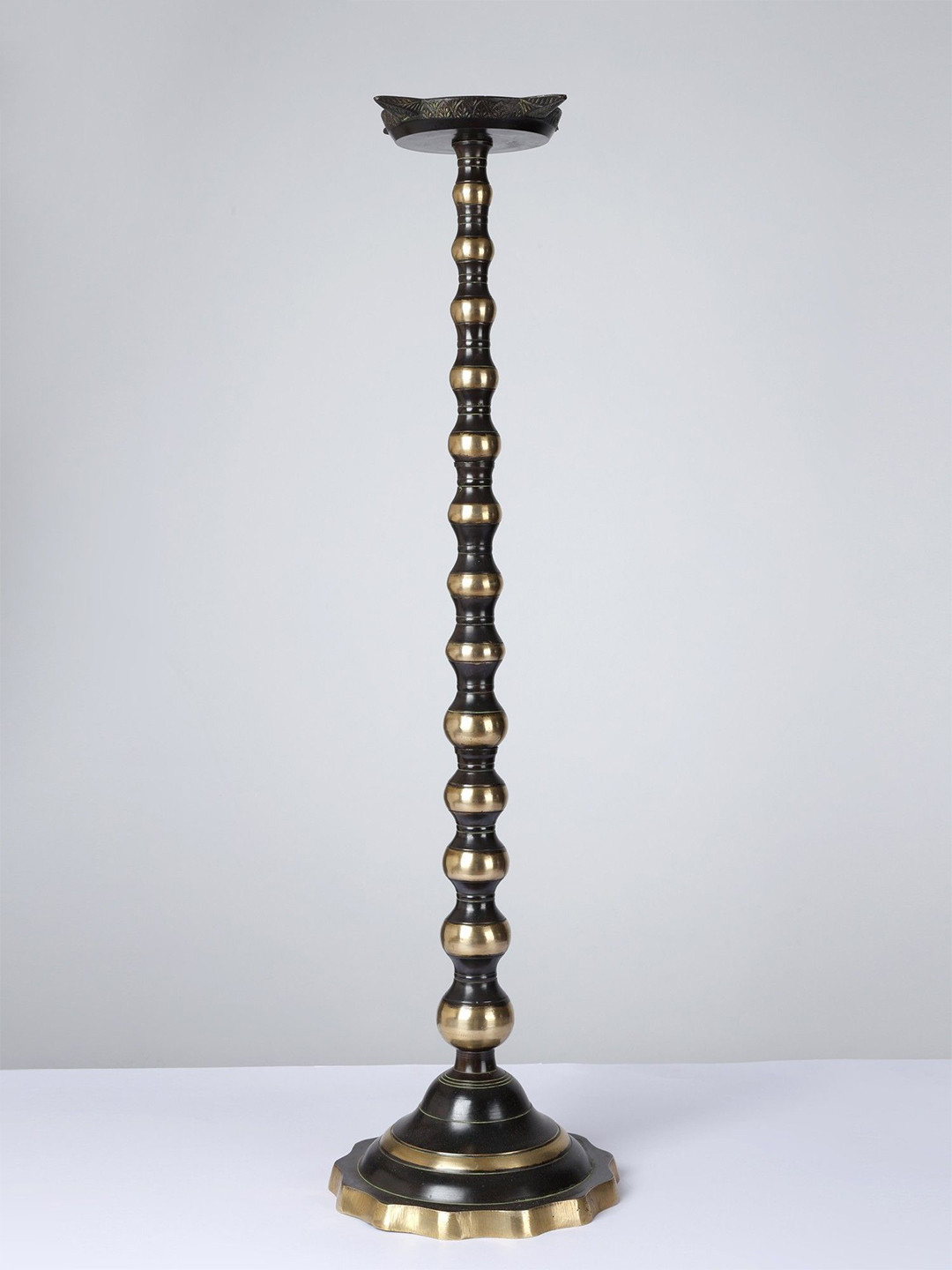 

Exotic India Brass Four Wicks Oil Lamp with Stand, Gold