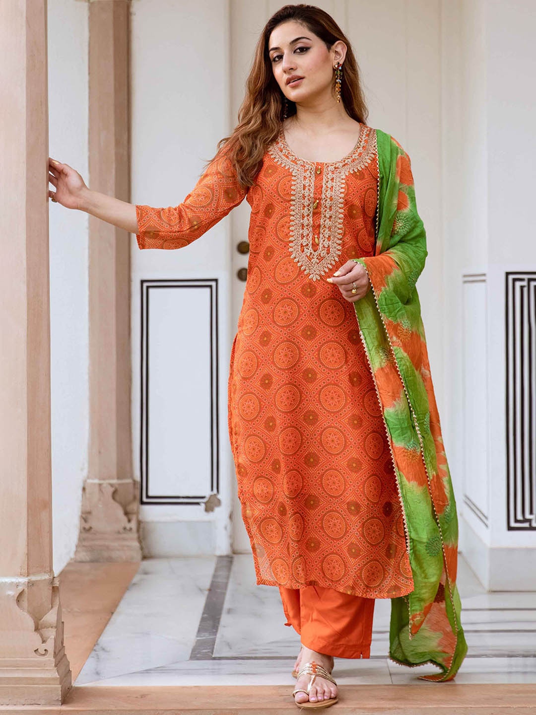 

Nehamta Women Bandhani Printed Regular Beads and Stones Kurta with Trousers & With Dupatta, Orange