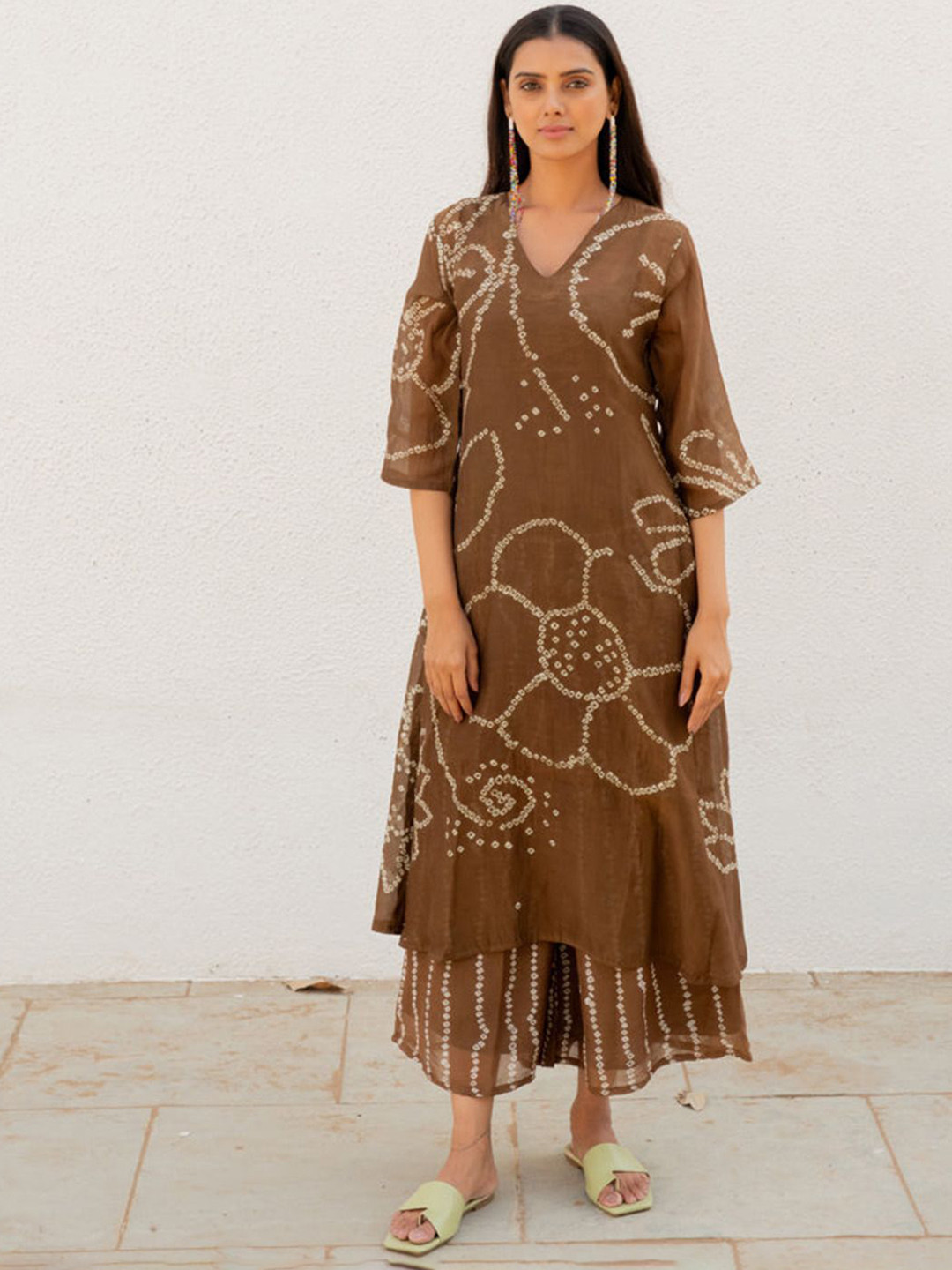 

Anni Designer Women Floral Printed Regular Kurta with Palazzos, Brown