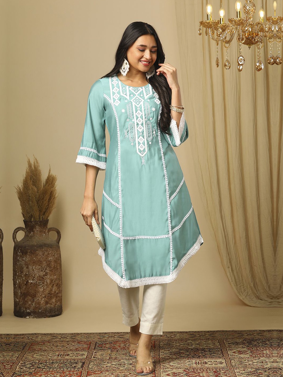 

Globus Women Ethnic Motifs Embroidered Flared Sleeves Thread Work Lace Frills Bows and Ruffles Kurta, Green