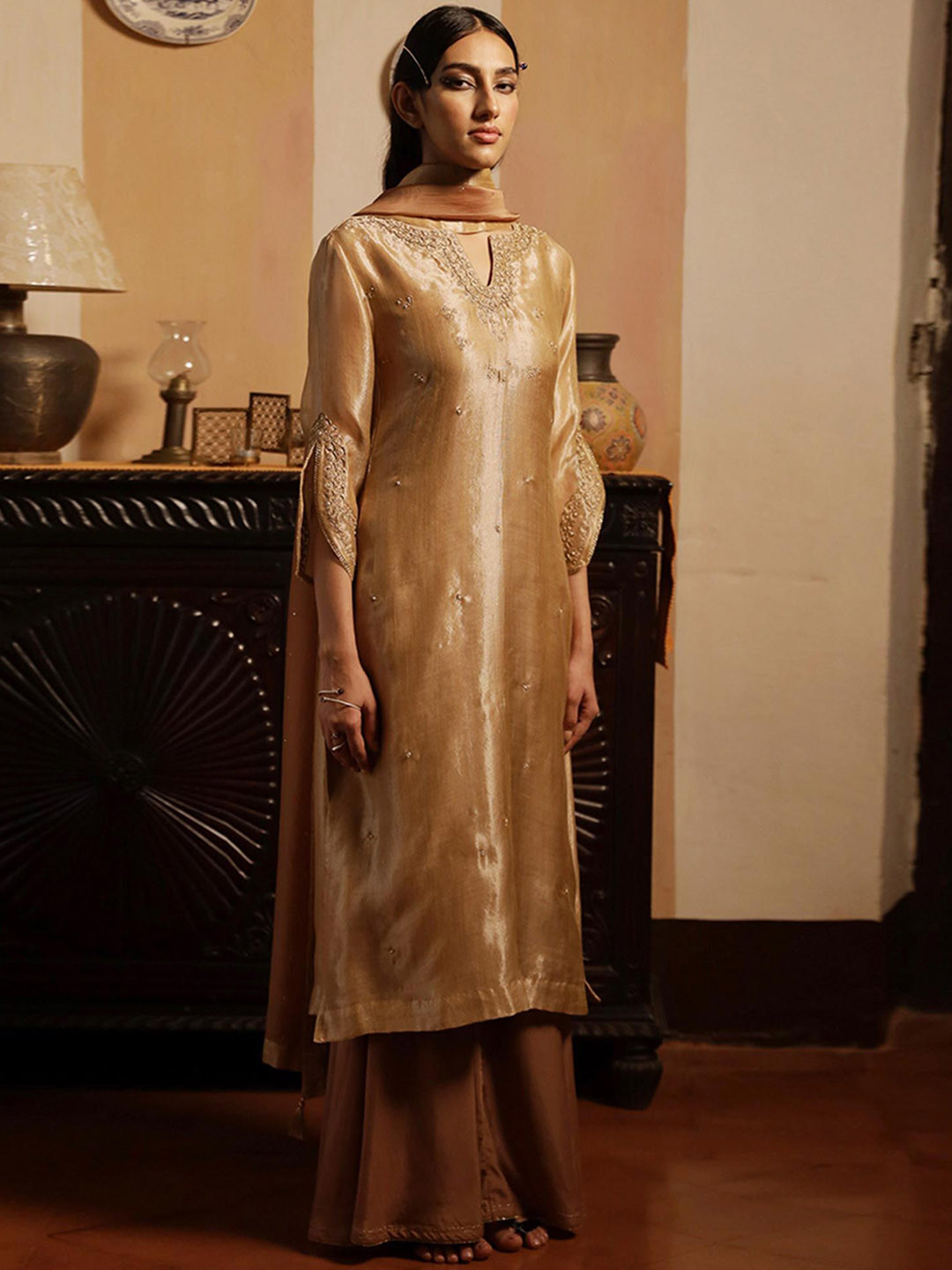 

Ganga Women Ethnic Motifs Embroidered Regular Zardozi Kurta with Sharara & With Dupatta, Gold