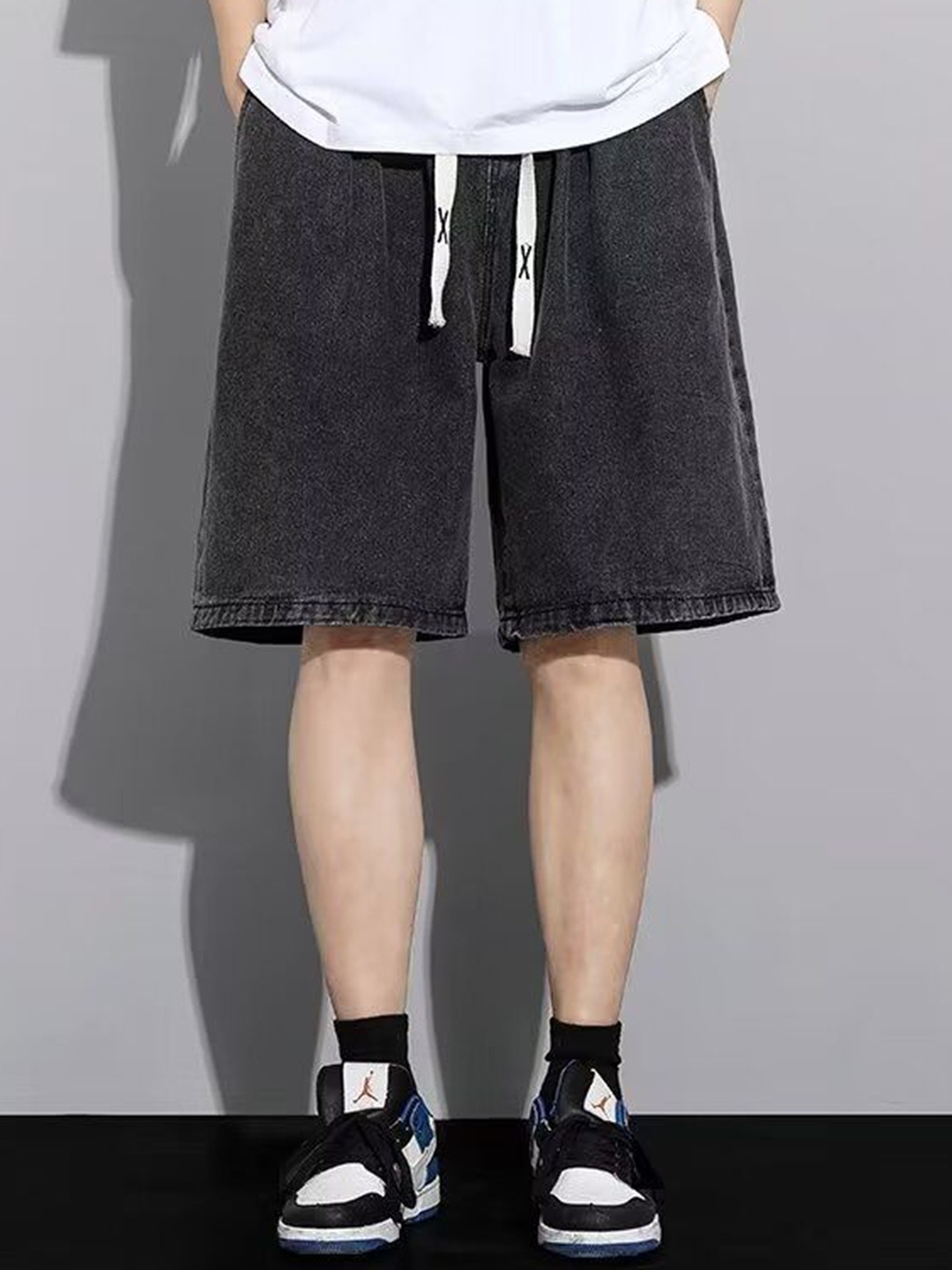 

StyleCast Men Solid Mid-Rise Shorts, Black