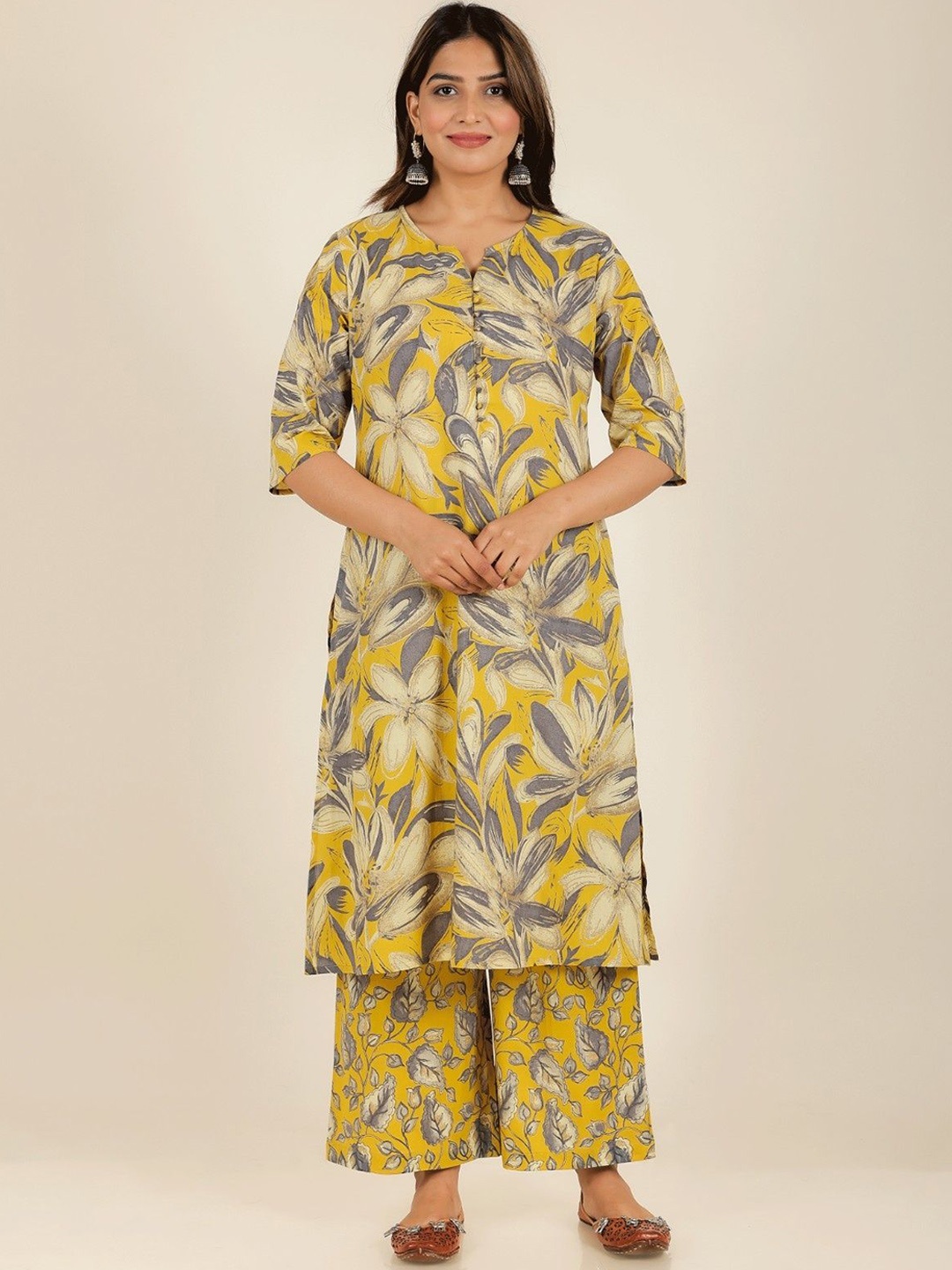 

Aramya Women Floral Printed Regular Beads and Stones Pure Cotton Kurta with Palazzos, Yellow