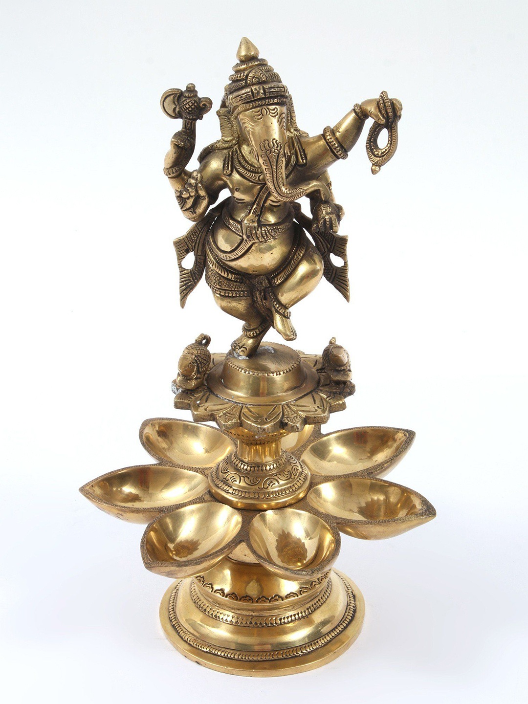 

Exotic India 12" Brass Nritya Ganesha Statue on Seven Wicks Oil Lamp, Gold