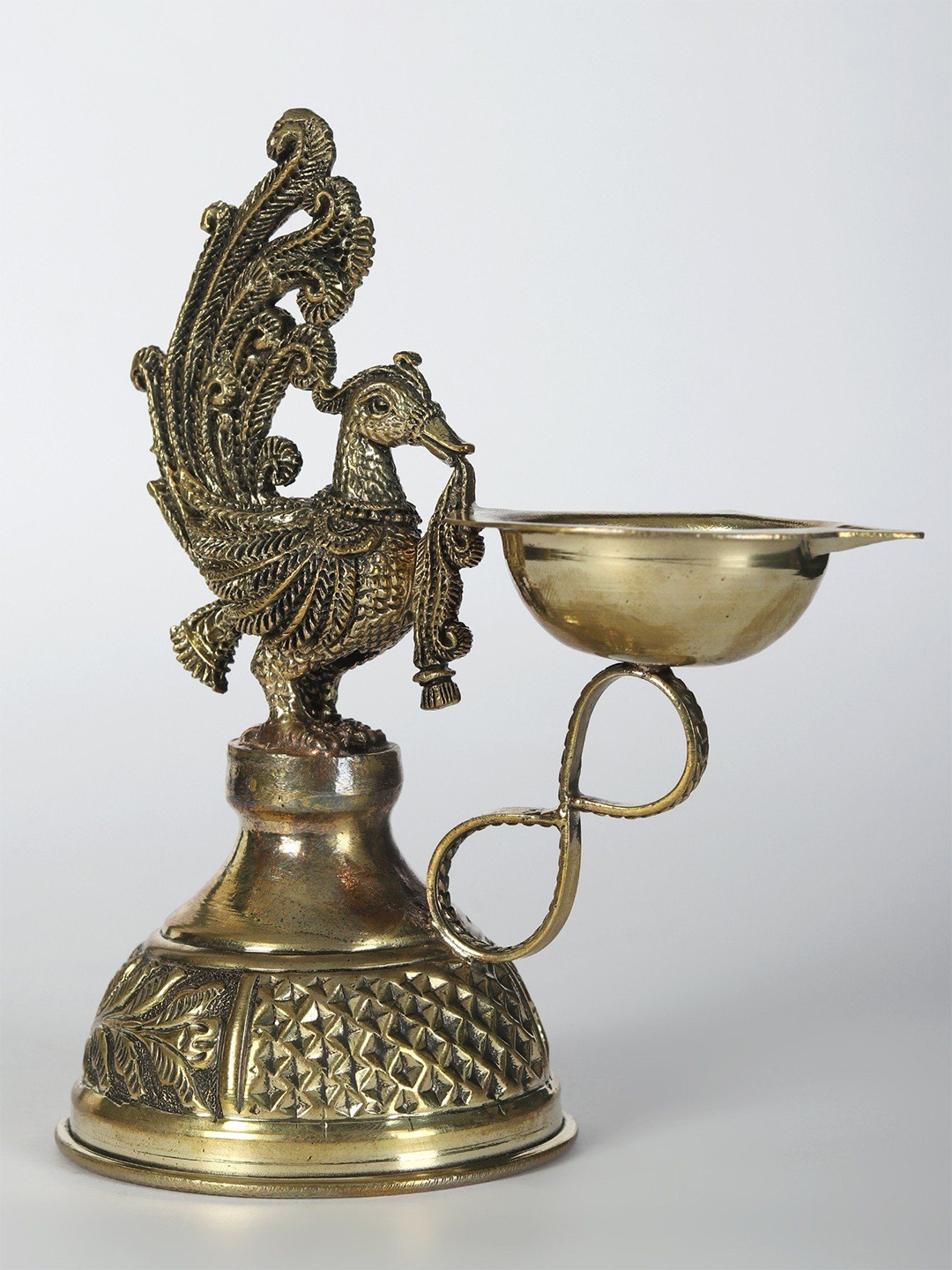 

Exotic India 5" Small Brass Superfine Attractive Peacock Diya (Oil Lamp), Gold
