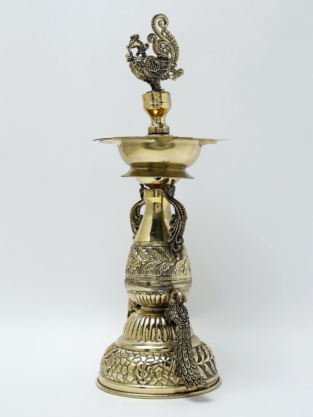 

Exotic India 11" Superfine Five Wicks Designer Peacocks Lamp (Diya) in Brass, Gold