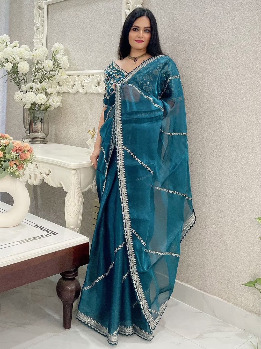 

Munir Ethnic Motifs Embroidered Organza Saree, Turquoise blue