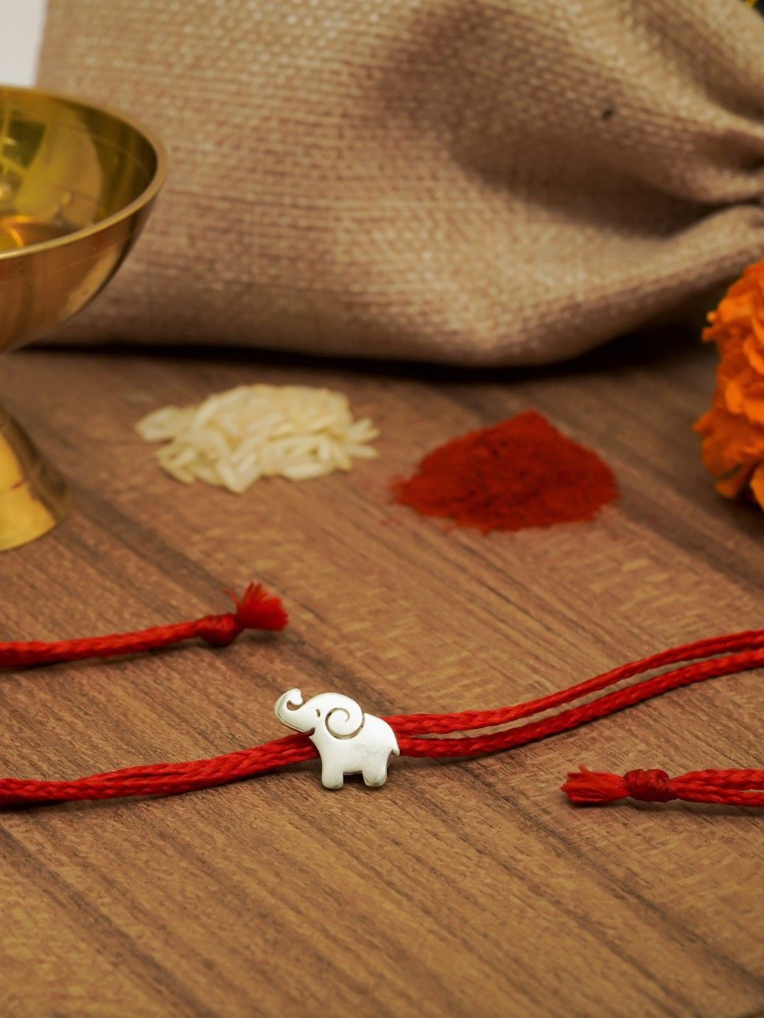 

Meenakari Heritage Jewellery Thread Rakhi, Red