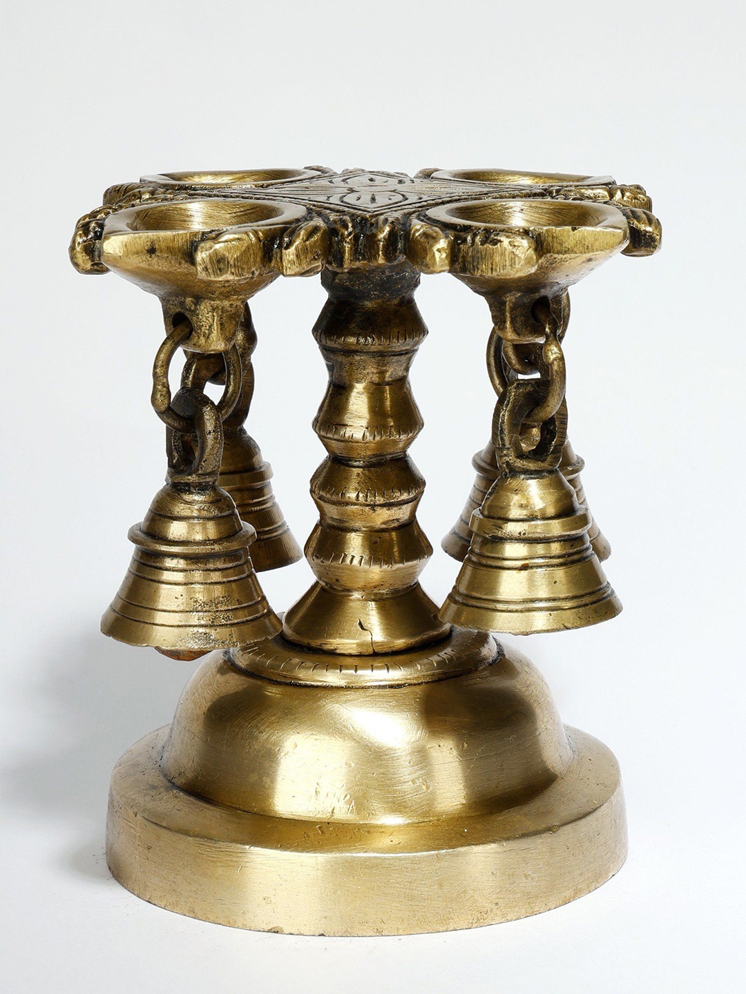 

Exotic India Brass Designer Four Wicks Lamp with Bells, Gold