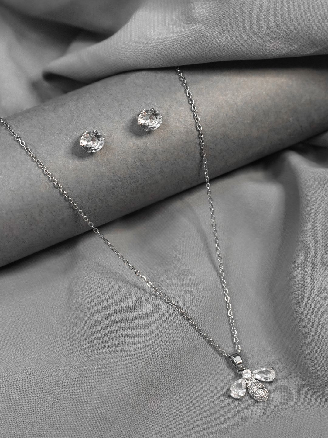 

Niscka Silver Plated AD Studded Jewellery Set