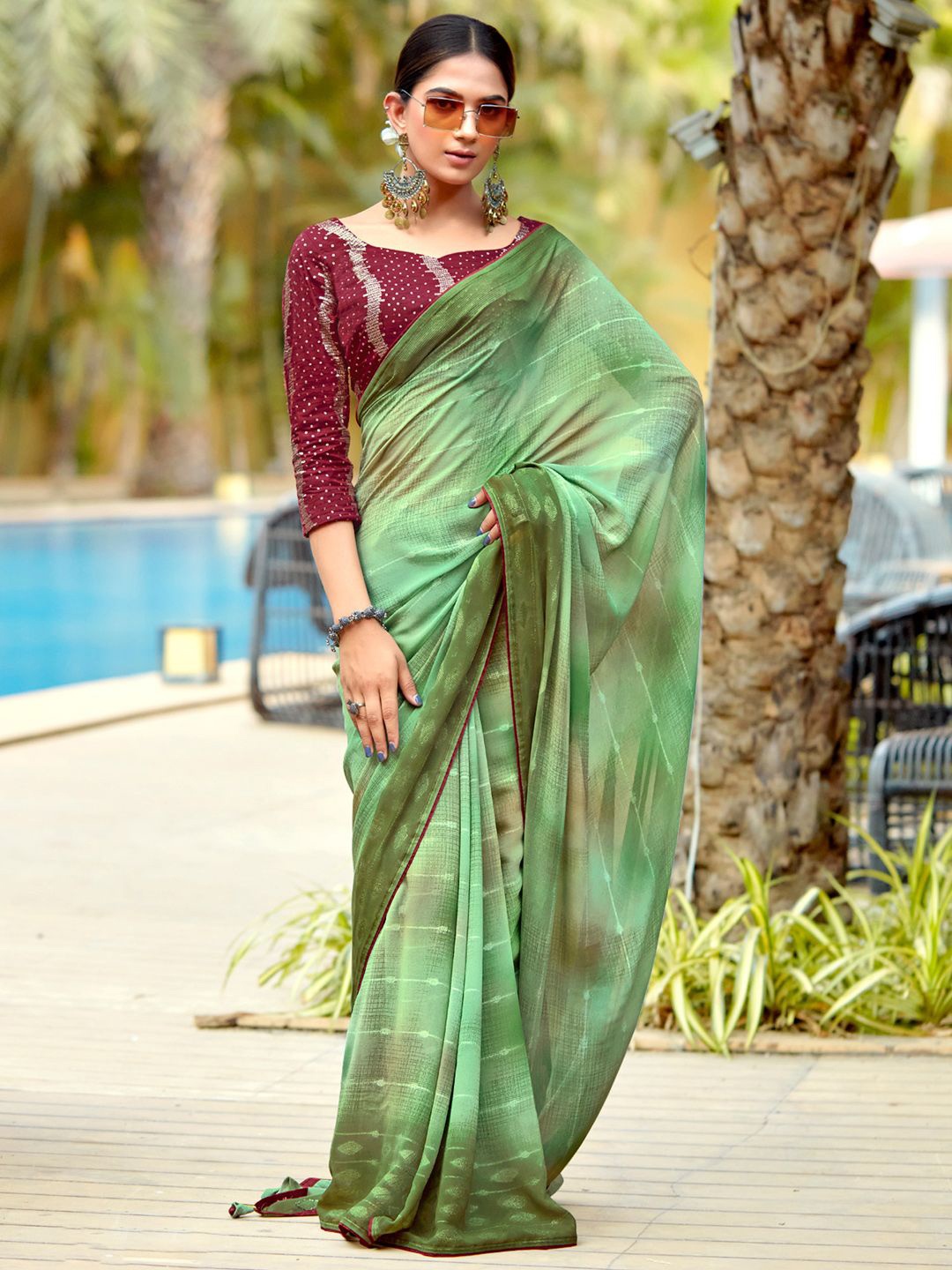 

Saree mall Ethnic Motifs Poly Georgette Sarees, Green