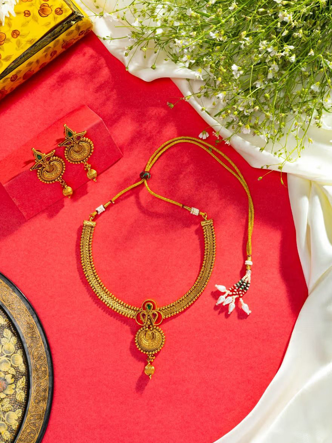

Niscka Gold Plated & Stone Studded Jewellery Set