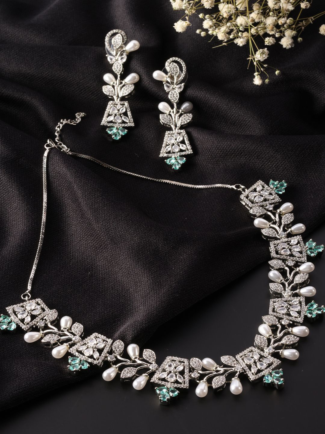 

Niscka Silver Plated AD & Pearl Studded Jewellery Set