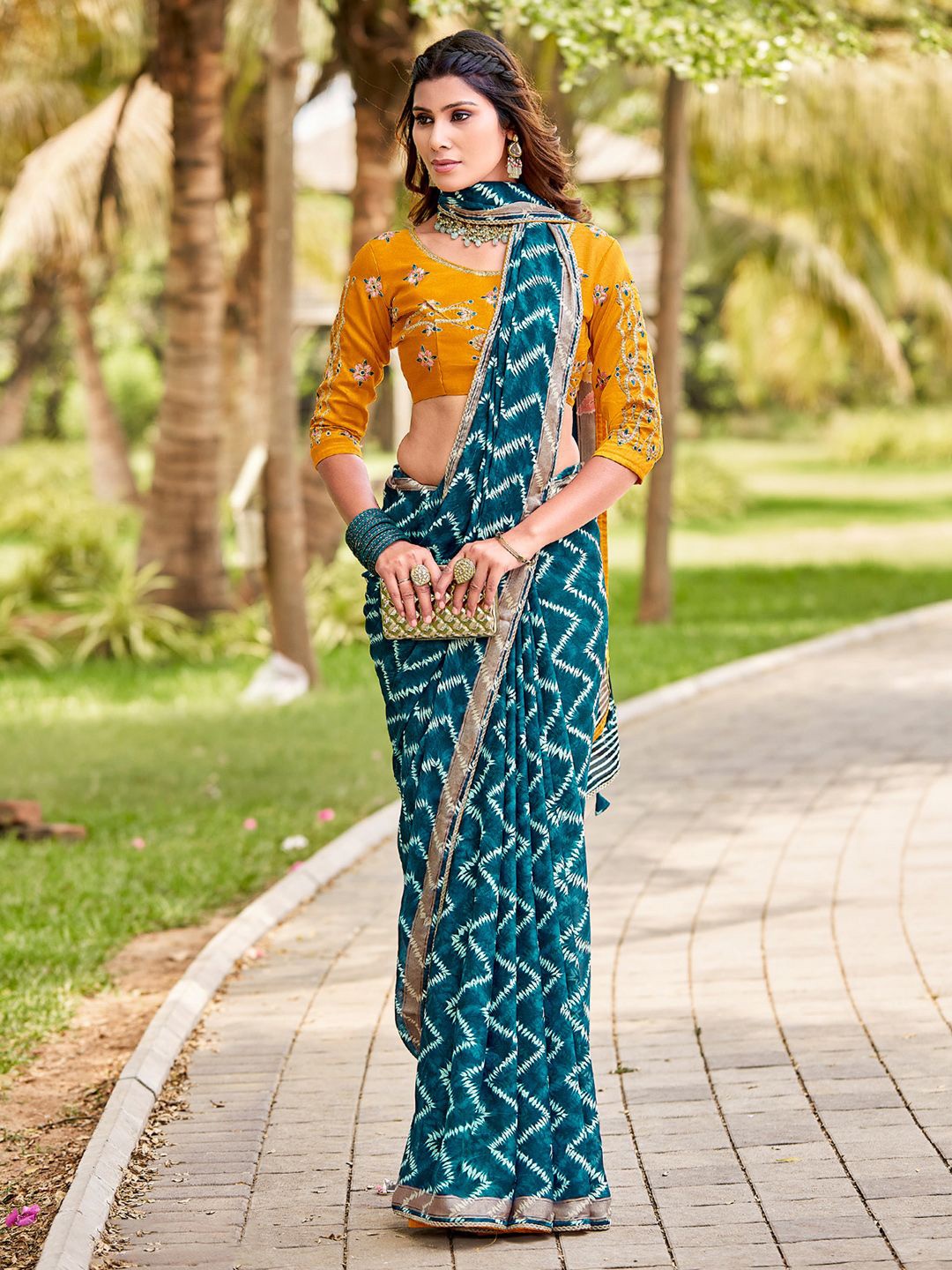 

Saree mall Zari Poly Georgette Designer Sarees, Teal